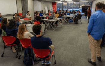 In April, UW-Madison Odyssey Project and Madison Commons cohosted a community event to discuss a call to action for a family scholar house in Madison. This housing would support student parent families. Photo by Jonás Tijerino.